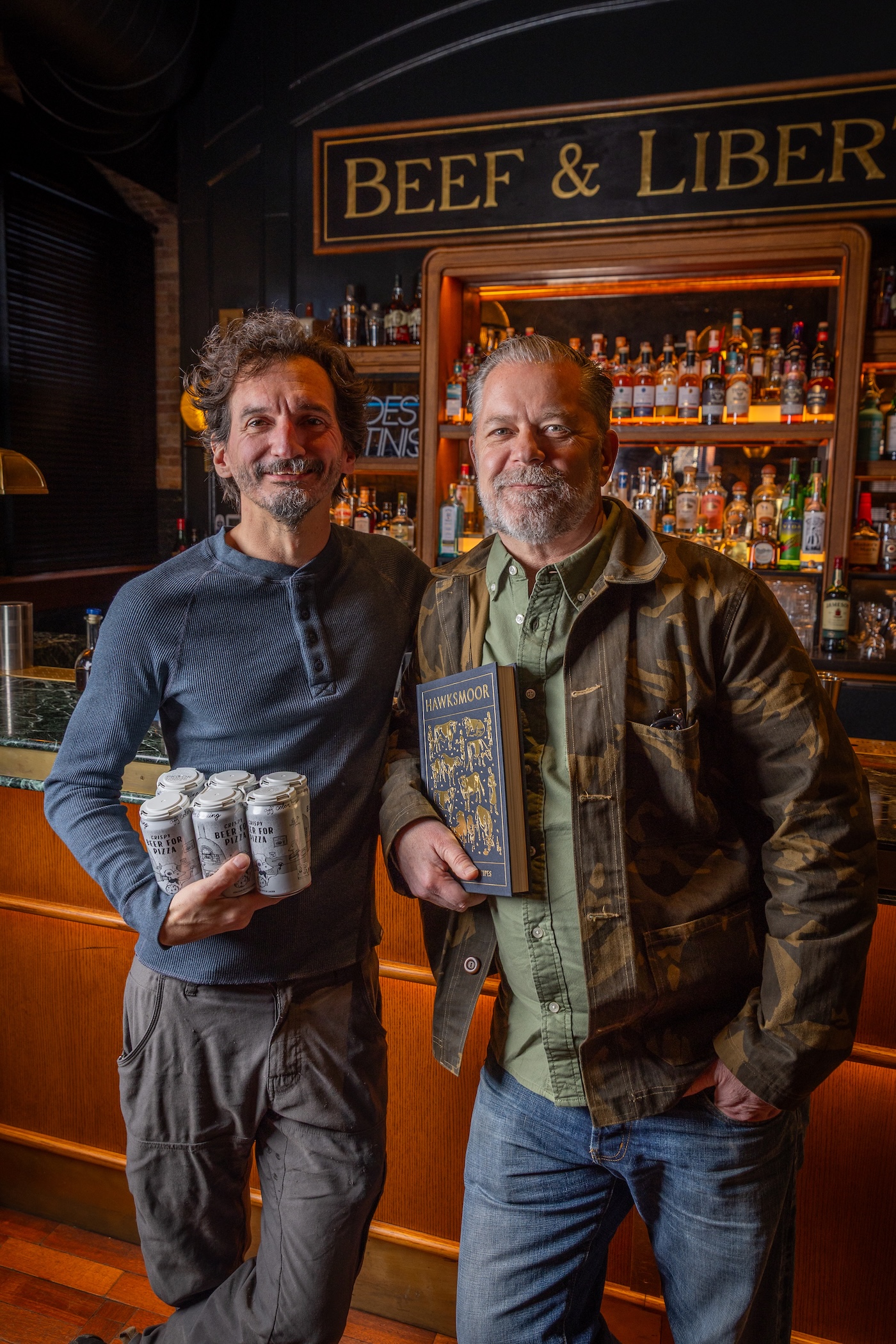 Chef John Manion + John Laffler standing together in front of the Beef and liberty bar