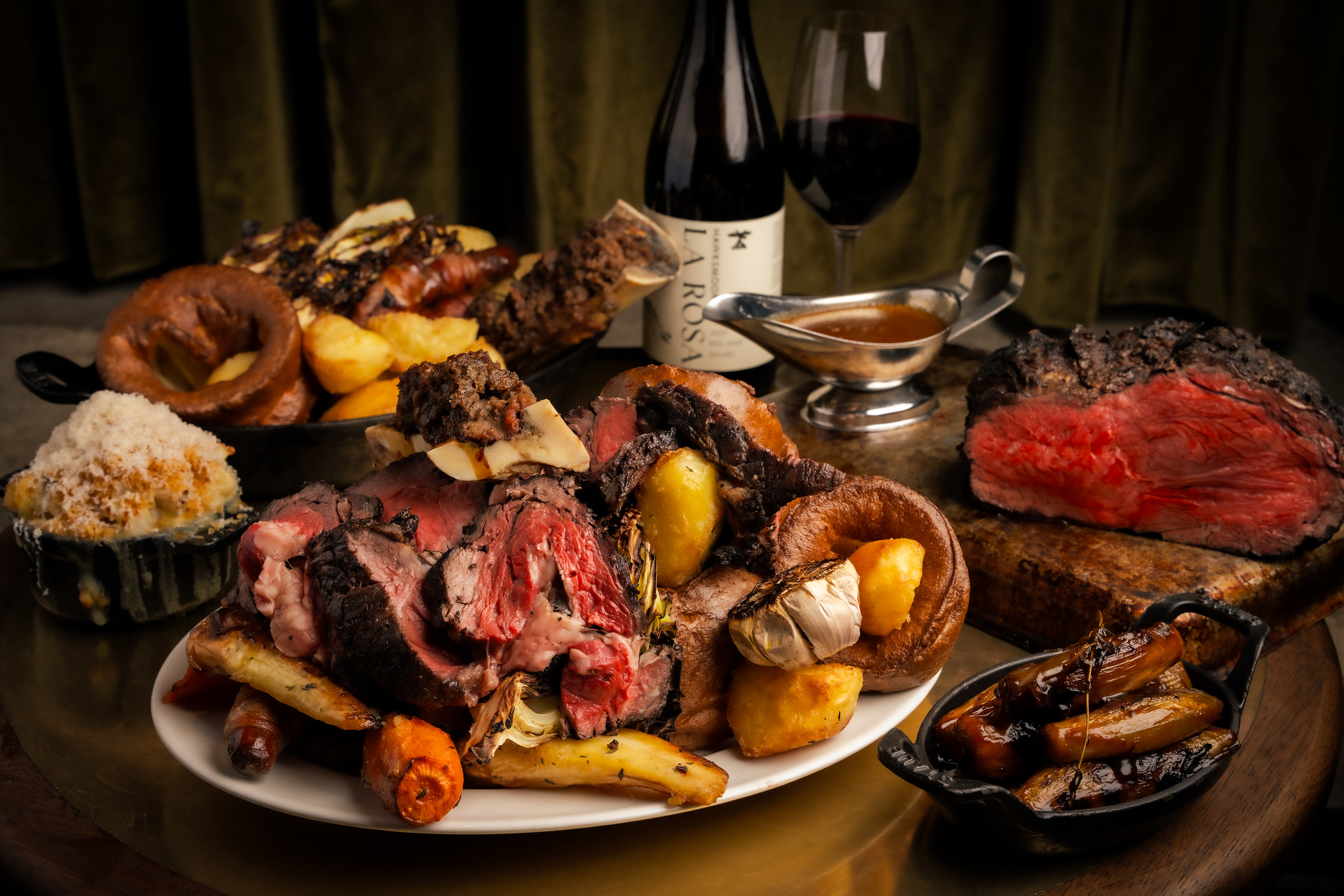 A sharing Sunday Roast - a platter piled up high with roast beef and all the traditional trimmings