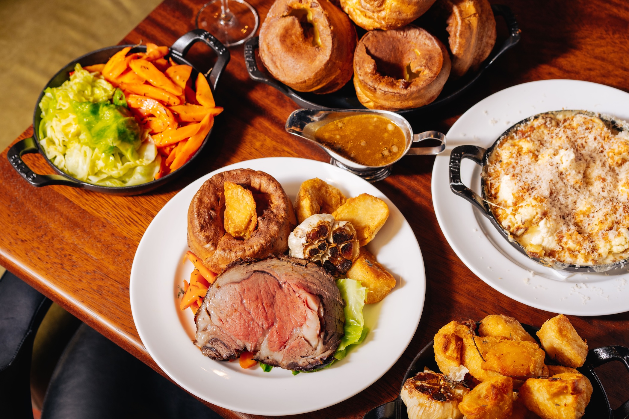 A plate of roast beef, with traditional sides & trimmings