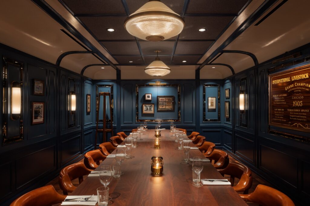 A full length room shot of the private dining room at Hawksmoor Chicago