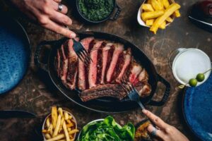 Hawksmoor Prime ribs with sides - Lifestyle