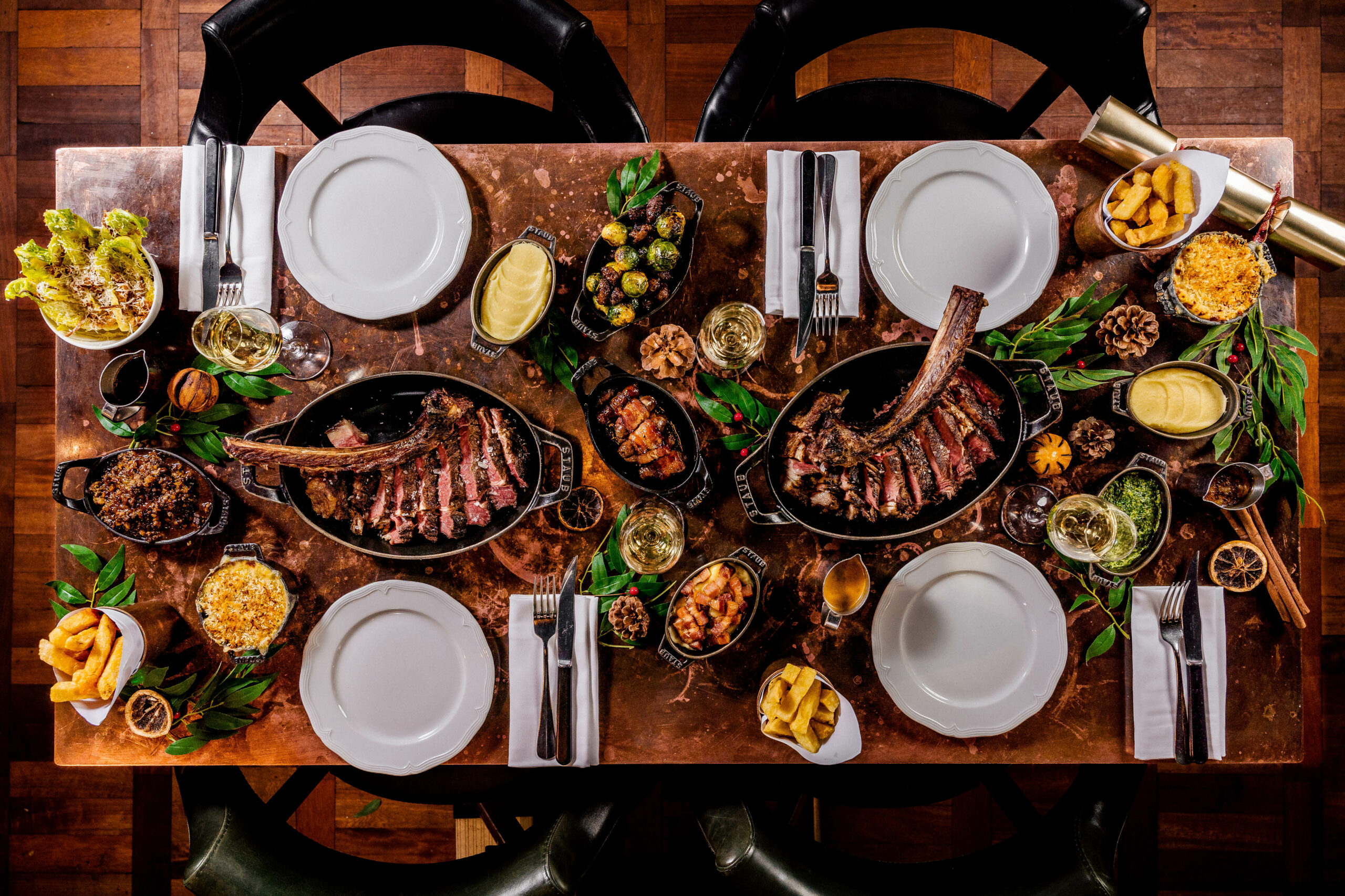 Christmas at Hawksmoor - dining table laden with steak and sides